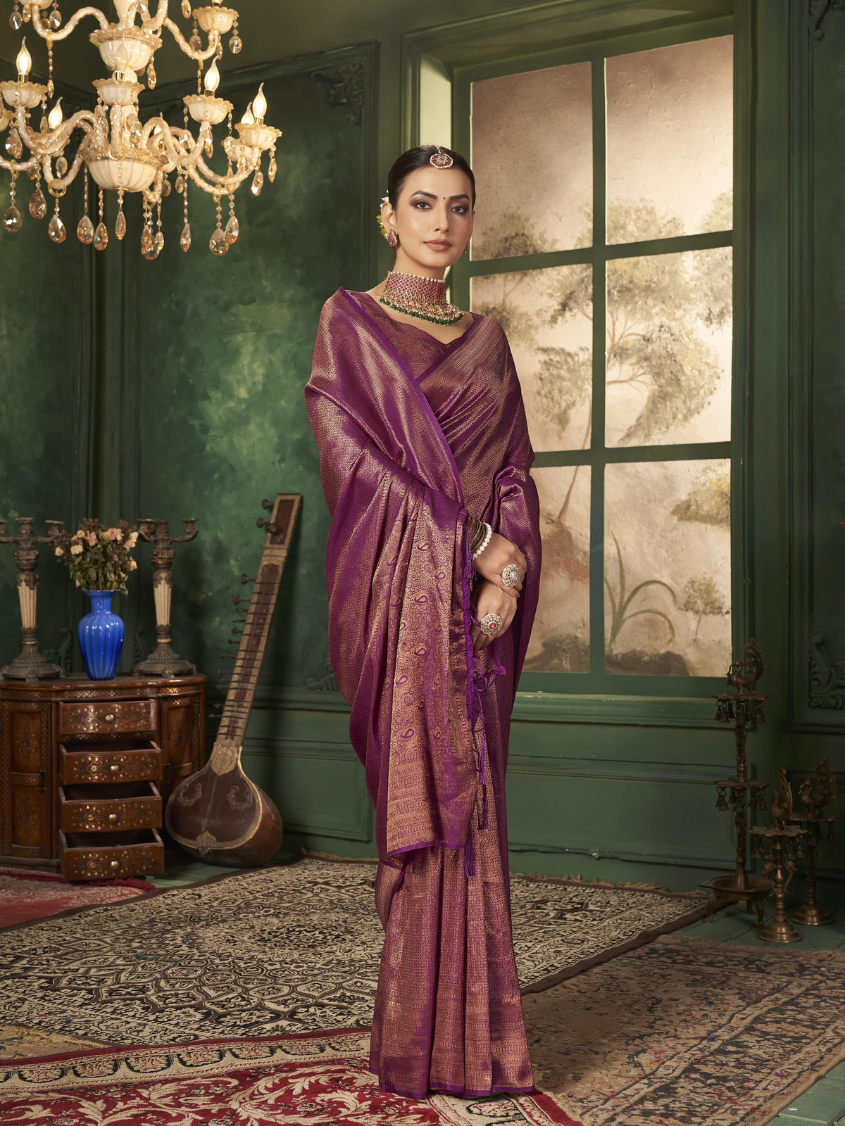 Banarasi silk saree in purple with gold zari work, ideal for weddings and festival celebrations.