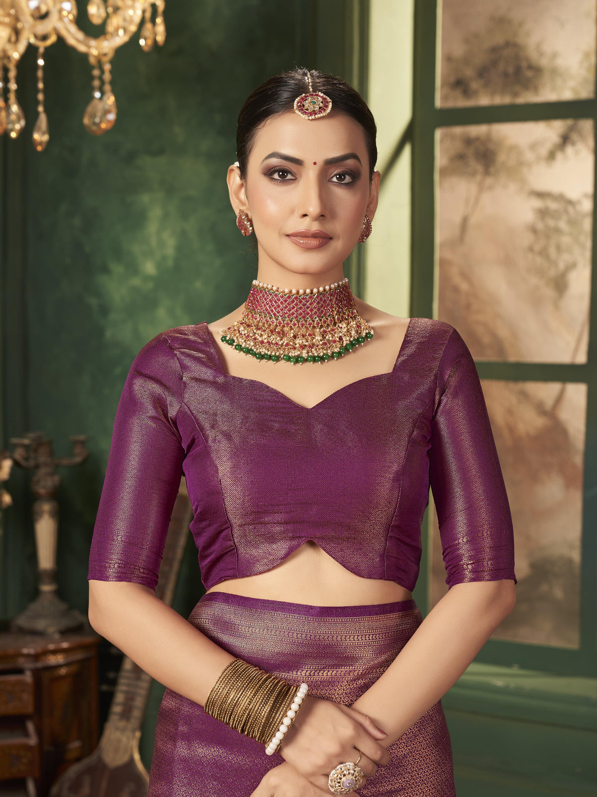 Designer blouse with a deep purple Banarasi silk saree for weddings and special events