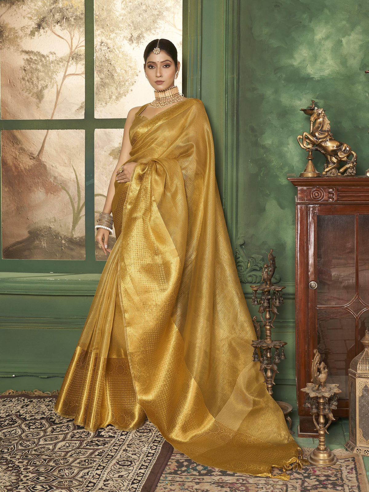 Golden Banarasi saree with zari work, perfect for weddings and festivals.