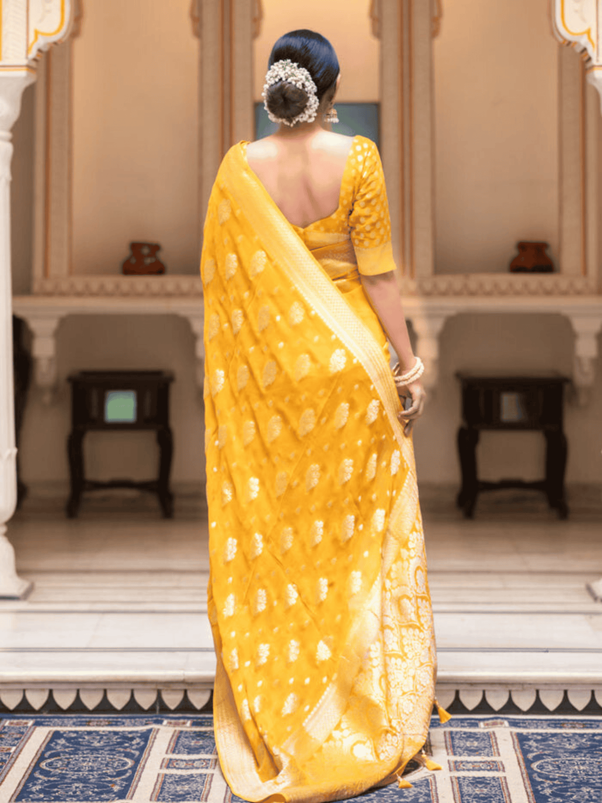 Regal Mustard Yellow Banarasi Khaddi Georgette Saree with Gold Zari Embellishments